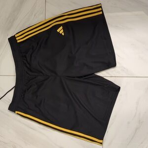 Adidas black and gold shorts